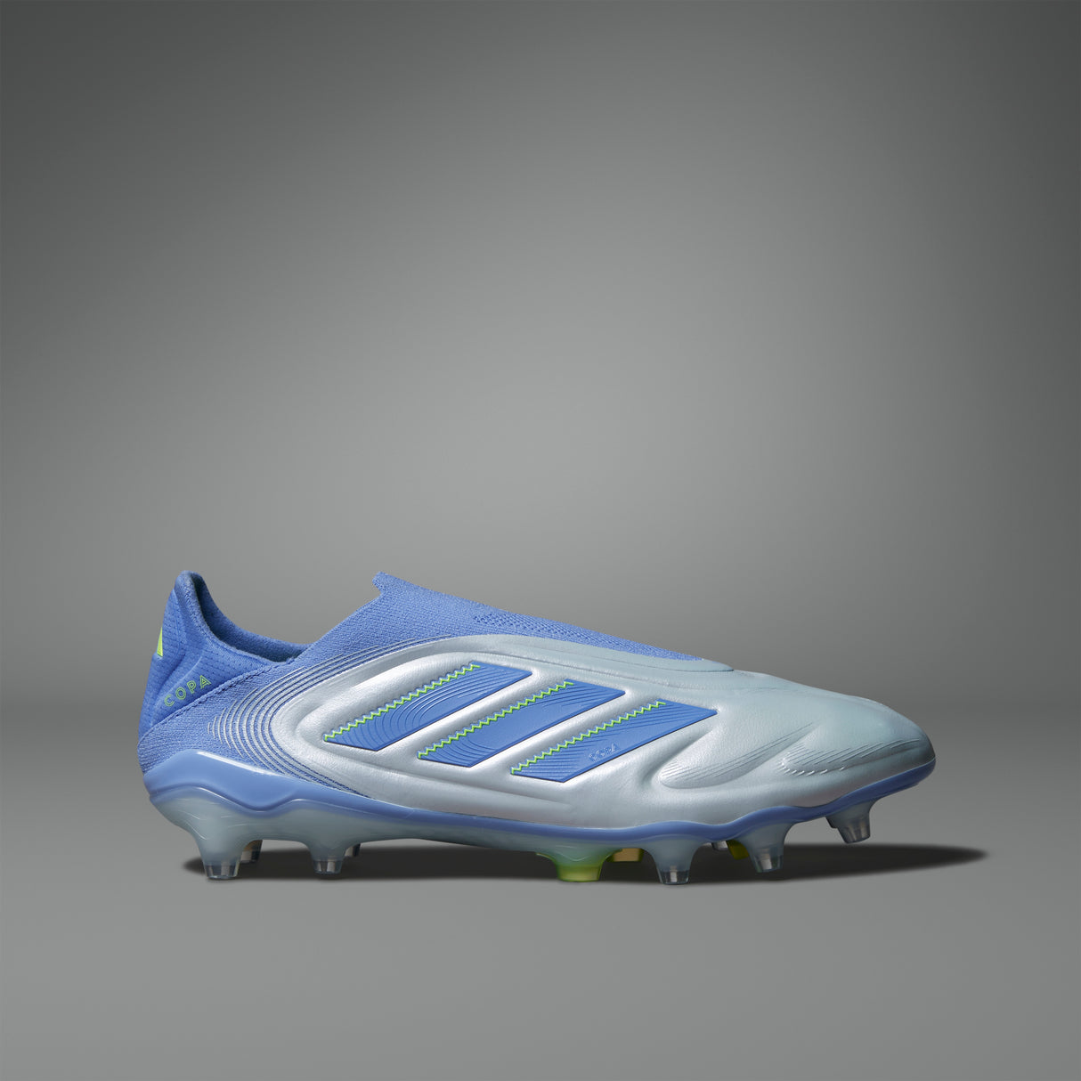 Botas de fútbol para terreno firme sin cordones adidas Copa Pure 3 Elite en color azul