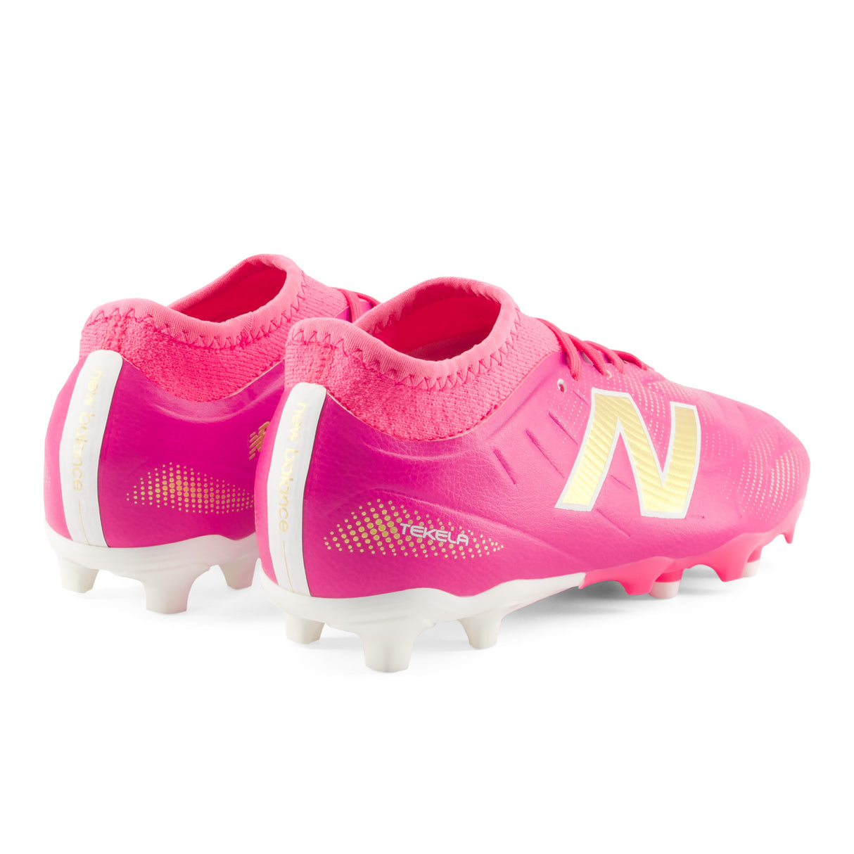 Tacos de fútbol juvenil New Balance Tekela Team Low V5 FG para terreno firme - Rosa Caliente