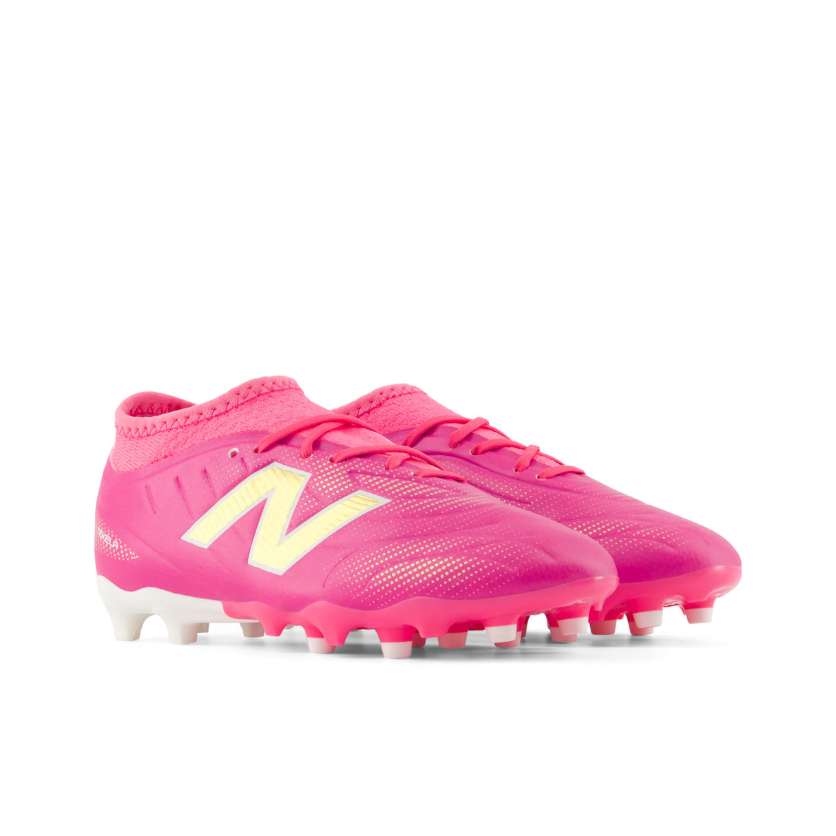 Tacos de fútbol juvenil New Balance Tekela Team Low V5 FG para terreno firme - Rosa Caliente