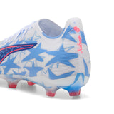 Botas de fútbol PUMA Ultra 6 Match KidSuper X CP FG/AG para hombre, terreno firme/artificial - Blanco/Rosa/Azul