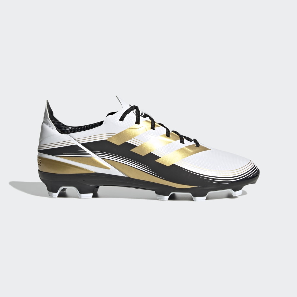 Botas de fútbol para terreno firme adidas Game Mode FG J para niños en blanco, dorado y negro