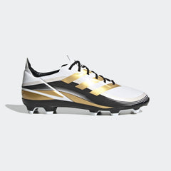 Botas de fútbol para terreno firme adidas Game Mode FG J para niños en blanco, dorado y negro