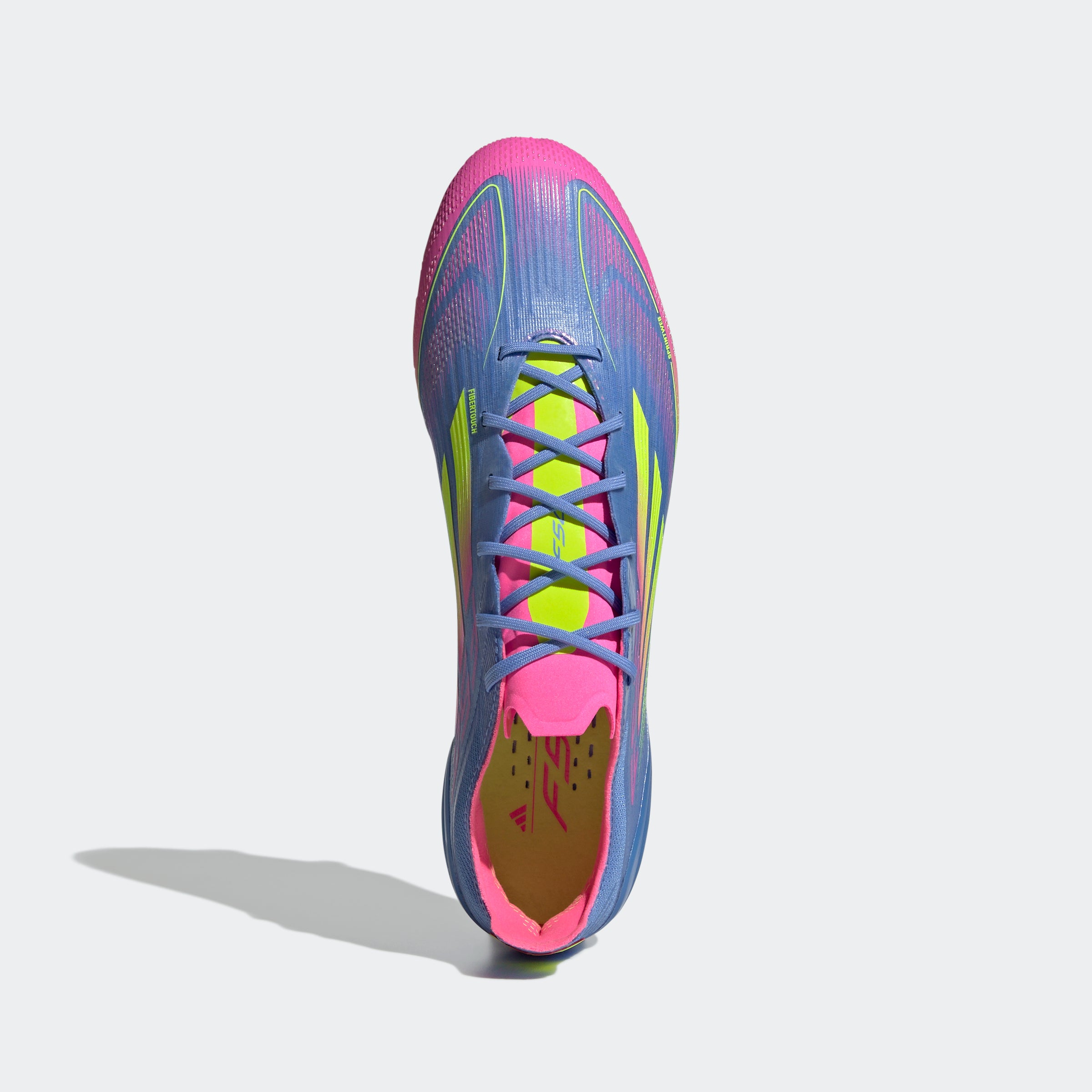 Botas de fútbol para terreno firme adidas F50 Elite en color azul y limón