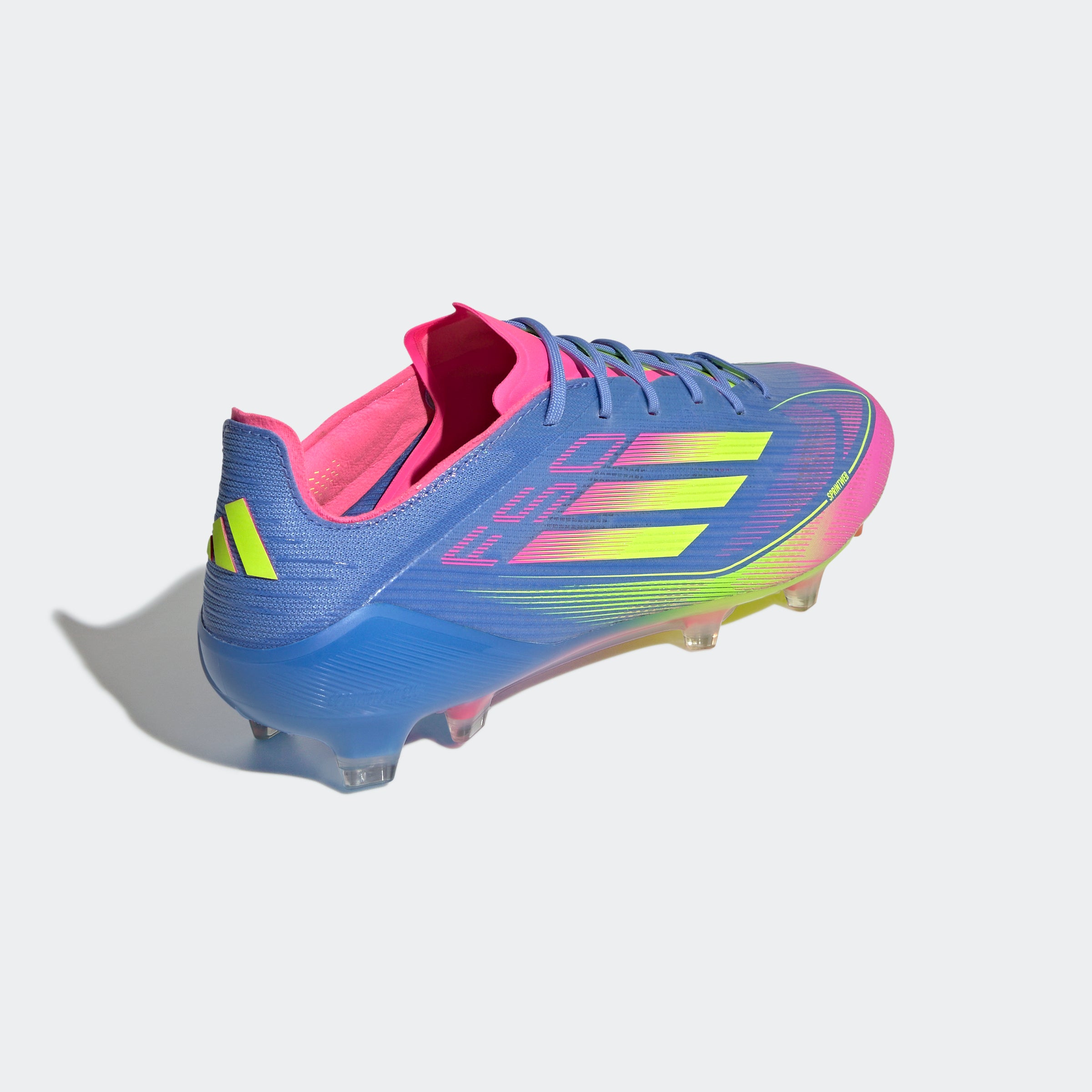 Botas de fútbol para terreno firme adidas F50 Elite en color azul y limón