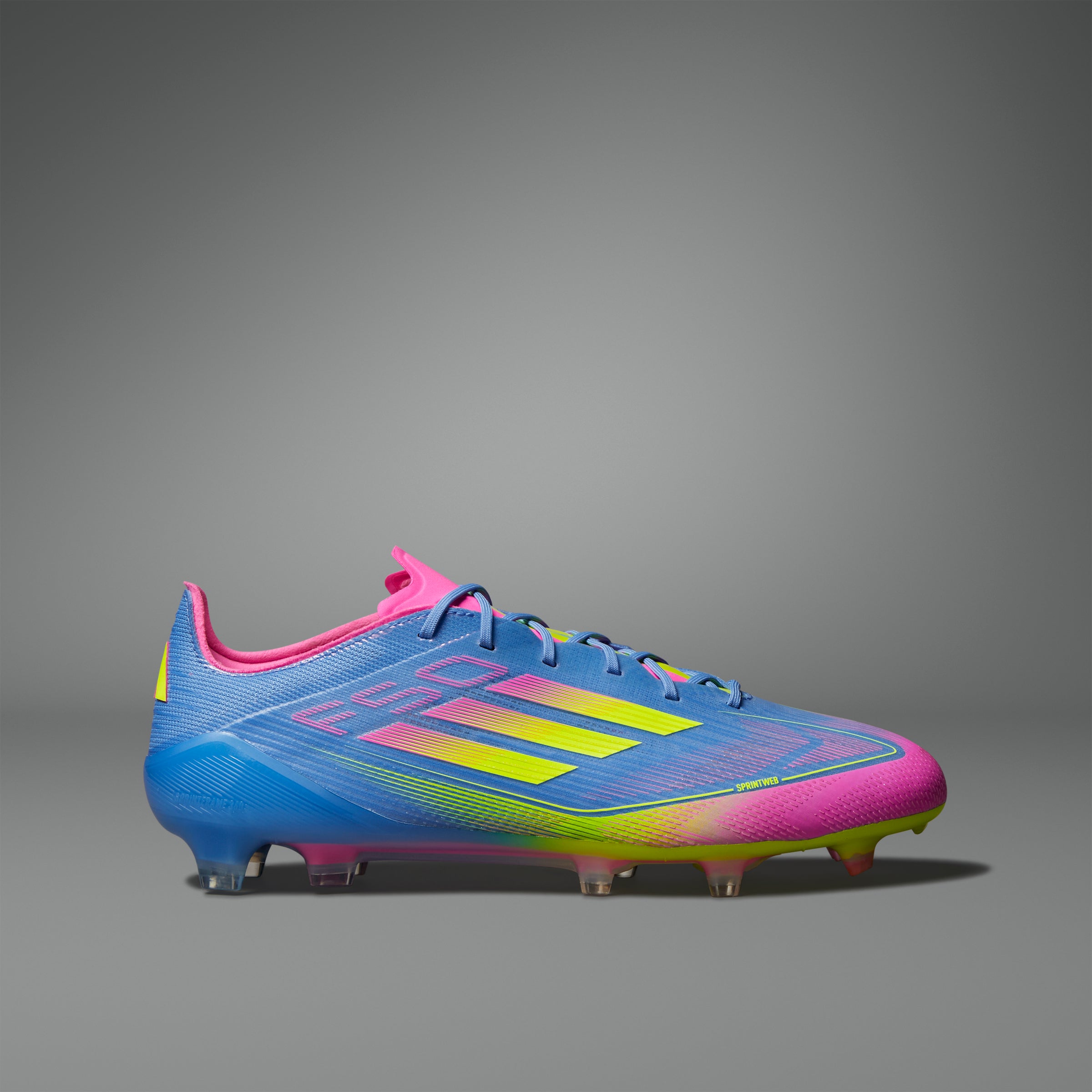 Botas de fútbol para terreno firme adidas F50 Elite en color azul y limón