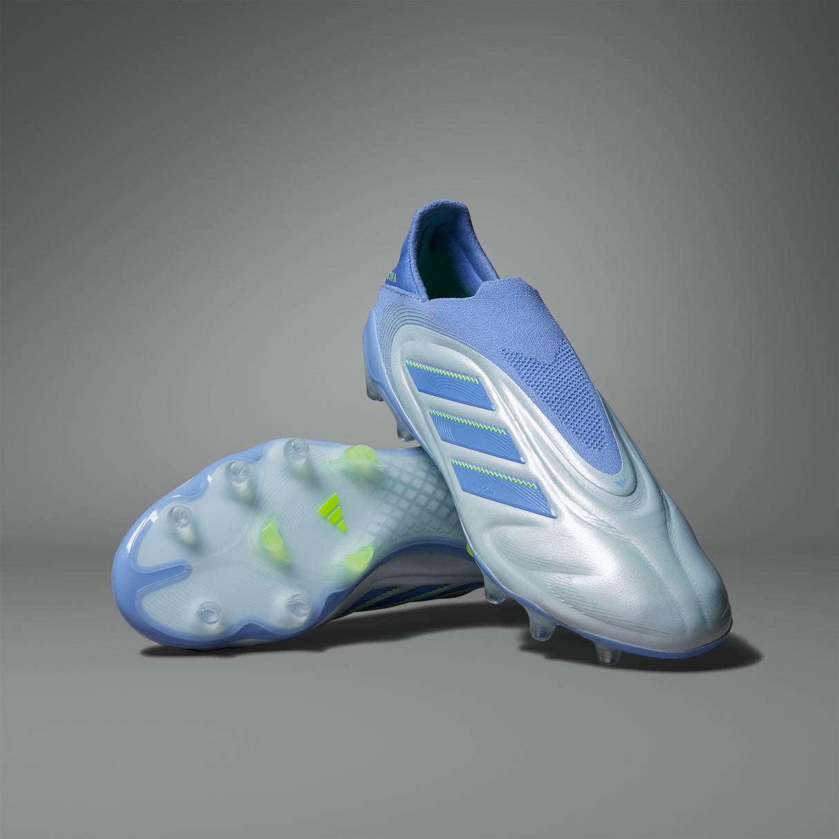 Botas de fútbol para terreno firme sin cordones adidas Copa Pure 3 Elite en color azul