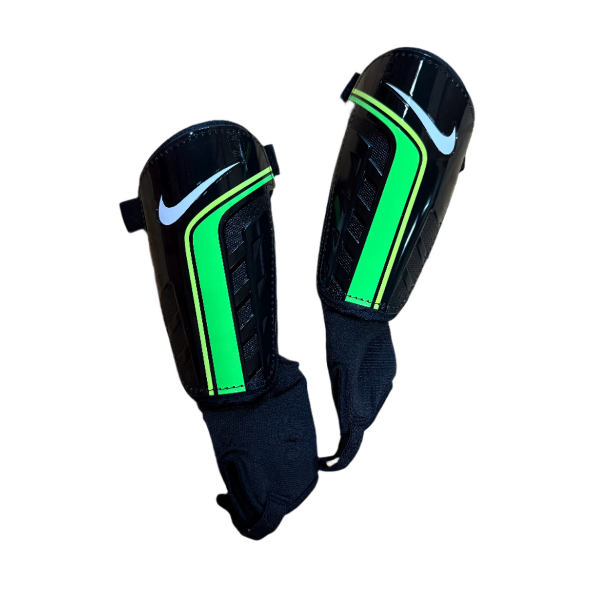 Espinillera Nike Shield negra y verde