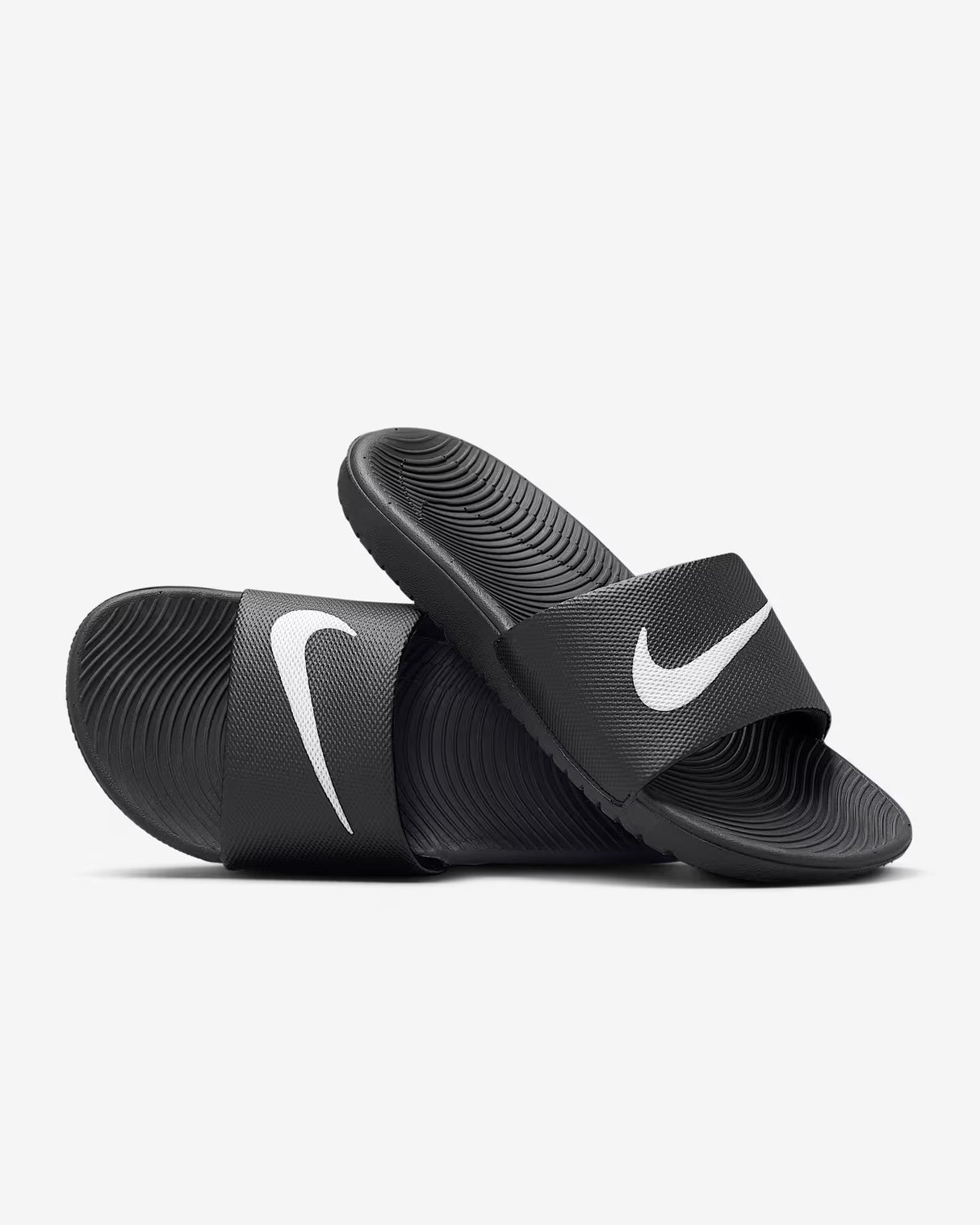 Chanclas Nike Kawa para niños en negro y blanco