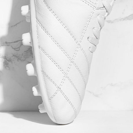 Botines de fútbol UNOZERO AG Black Modelo 1.0 - Blancos