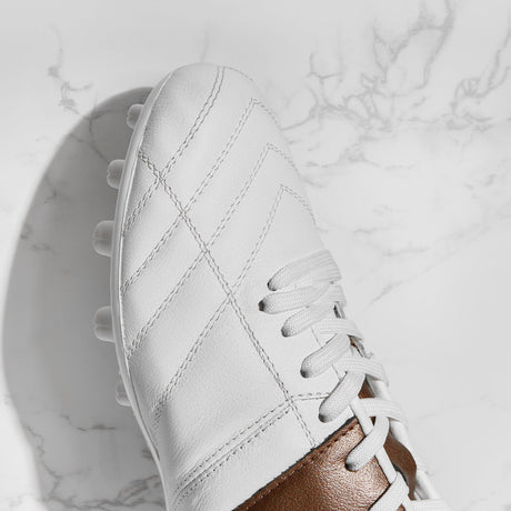 Botines de fútbol UNOZERO AG Black Modelo 1.0 - Blancos