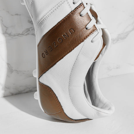 Botines de fútbol UNOZERO AG Black Modelo 1.0 - Blancos