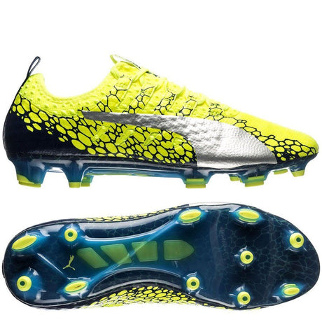 Botines de fútbol PUMA Evopower Vigor 1 Graphic FG para terreno firme - Amarillo seguridad/Plateado