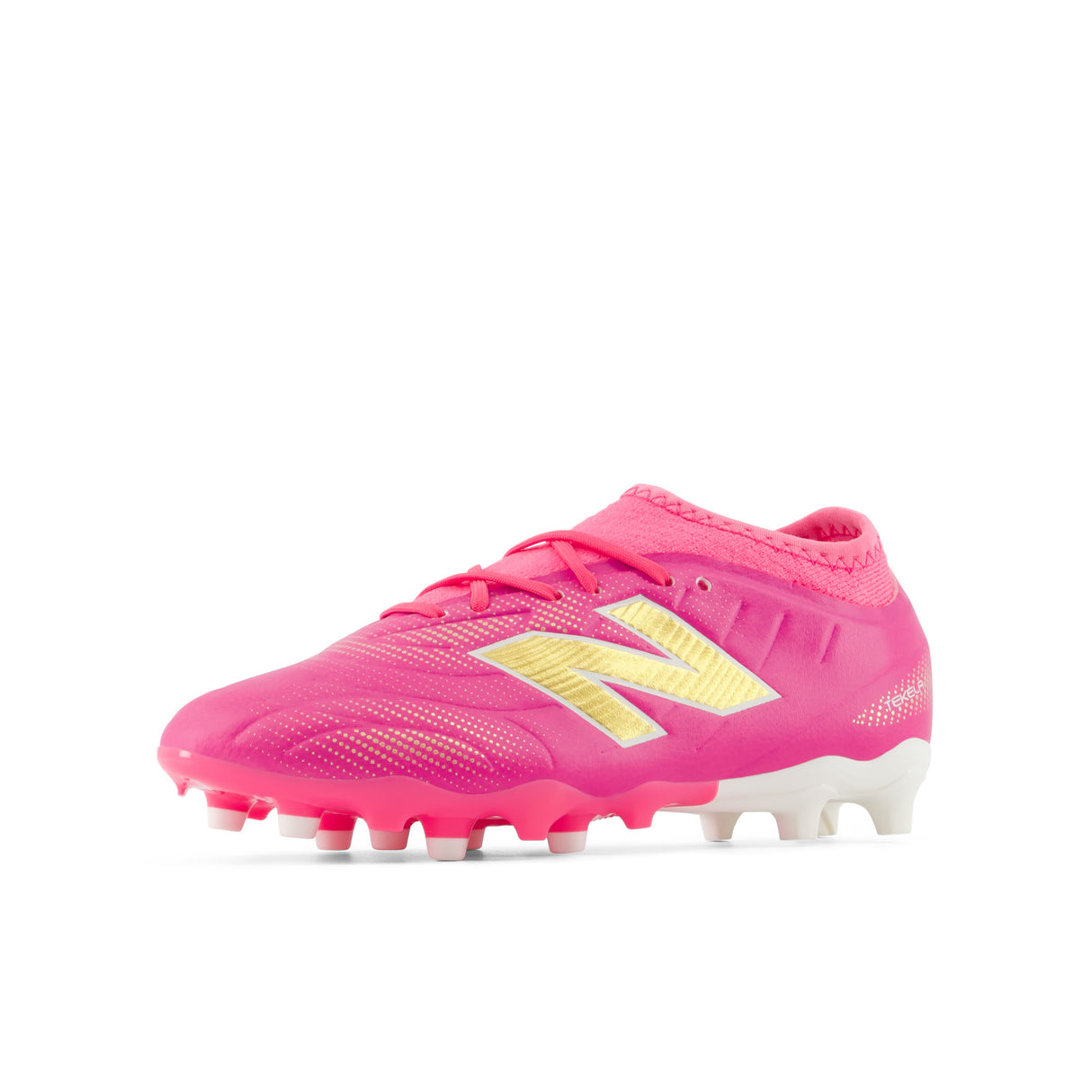 Tacos de fútbol juvenil New Balance Tekela Team Low V5 FG para terreno firme - Rosa Caliente