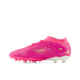 Tacos de fútbol juvenil New Balance Tekela Team Low V5 FG para terreno firme - Rosa Caliente