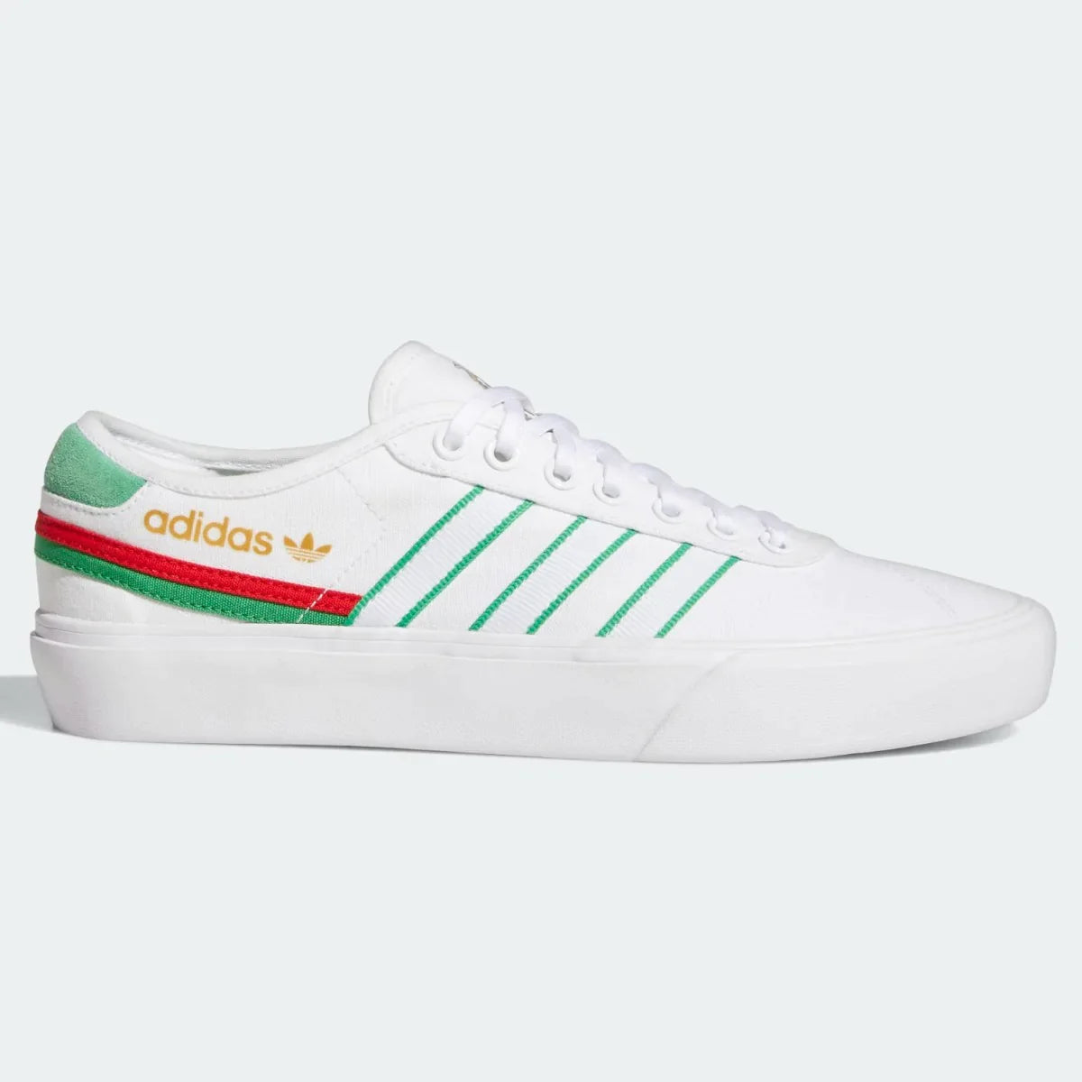 Adidas shoes white deals with green stripes